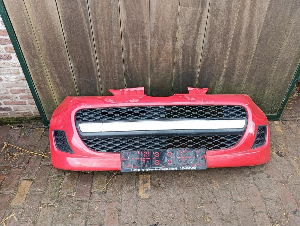 Peugeot 107 voor bumper, Ophalen