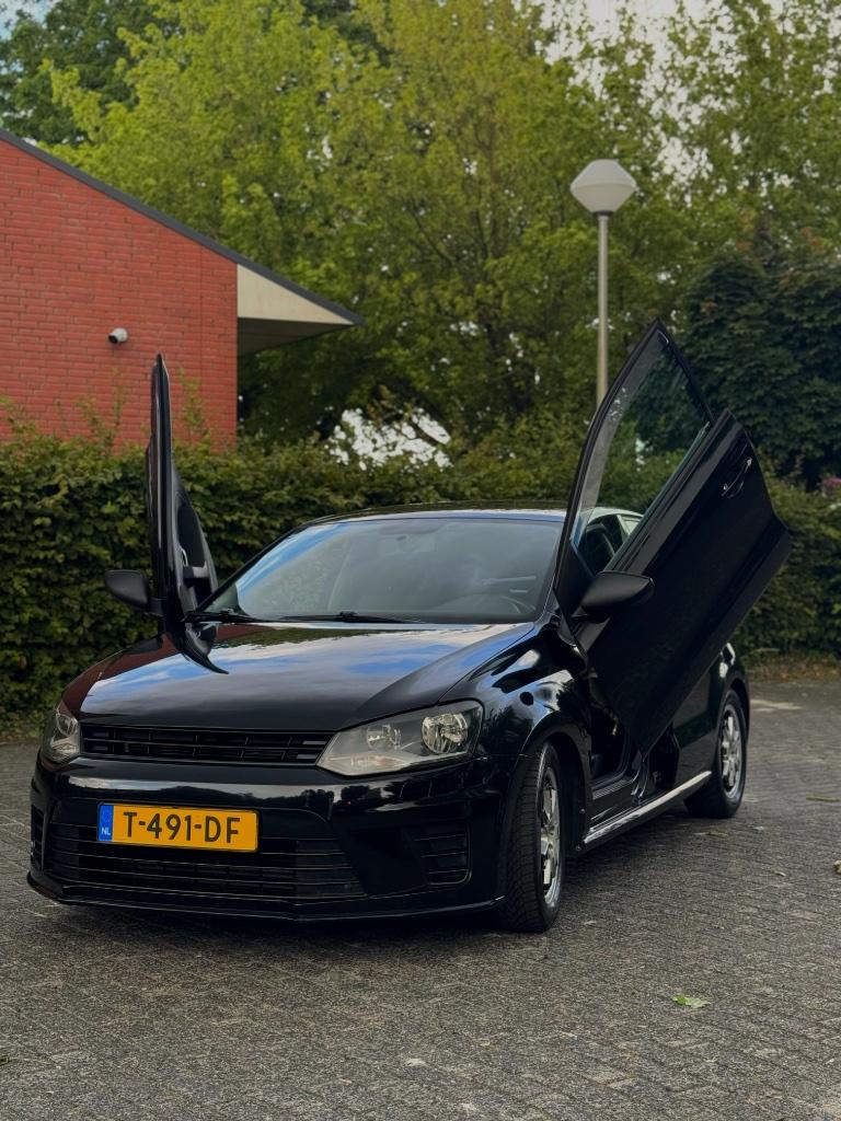 Volkswagen Polo 1.6 TDI 2009 Zwart, Auto's, Voorwielaandrijving, Euro 5, Stof, 74 pk