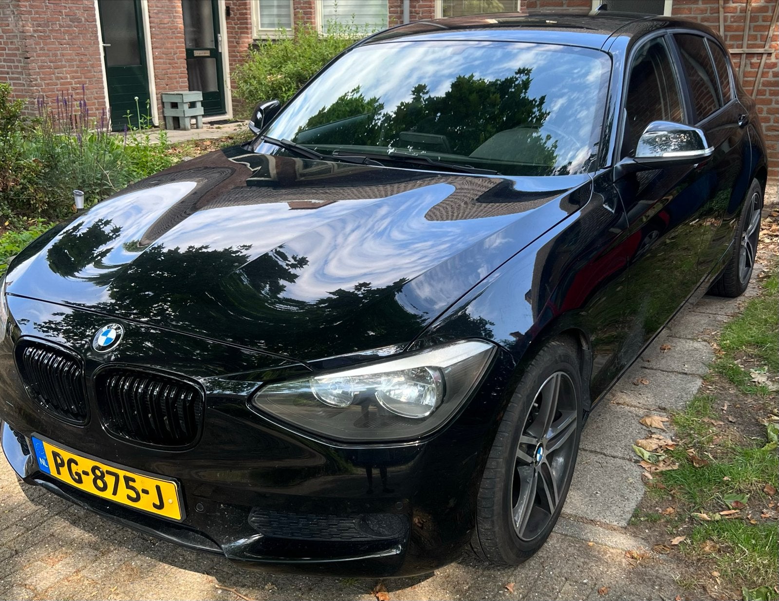 BMW 1-Serie 116i 136PK 5D Aut. 2014 Zwart, Auto's, 1295 kg, 4 cilinders, Zwart, 1200 kg