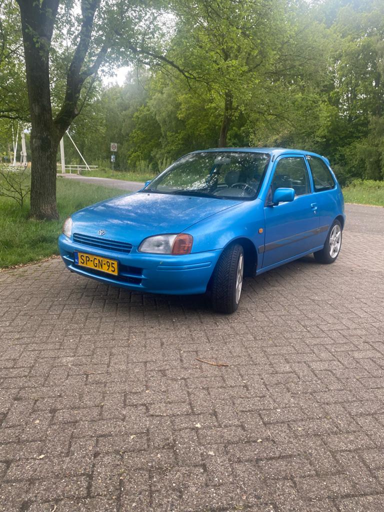Toyota Starlet 1.3 16V 1998 Blauw, Voorwielaandrijving, Panoramadak, Stof, 4 cilinders