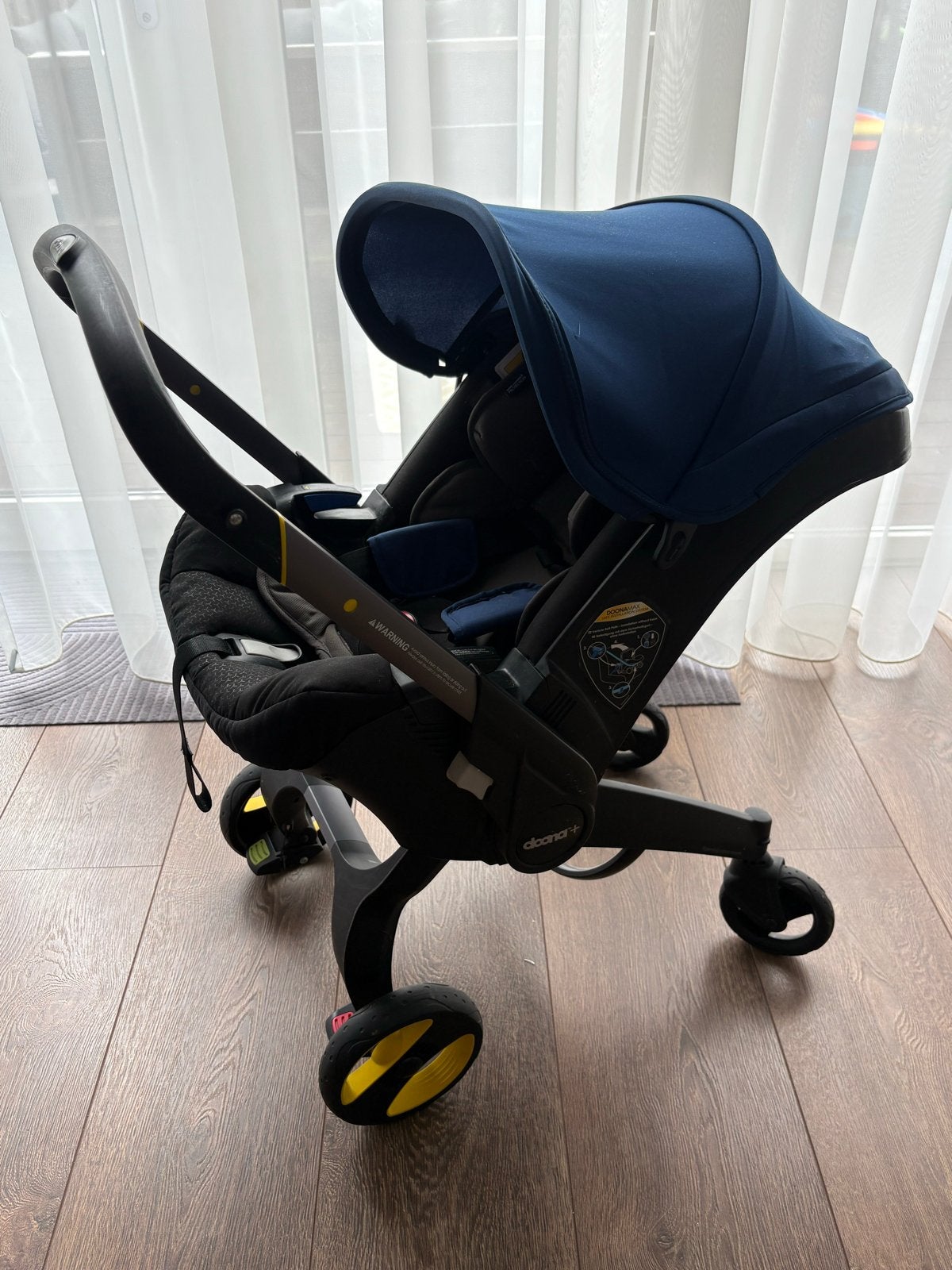 Doona Plus autostoel/kinderwagen met isofixbasis, Gebruikt, Isofix, 0 t/m 13 kg, Ophalen