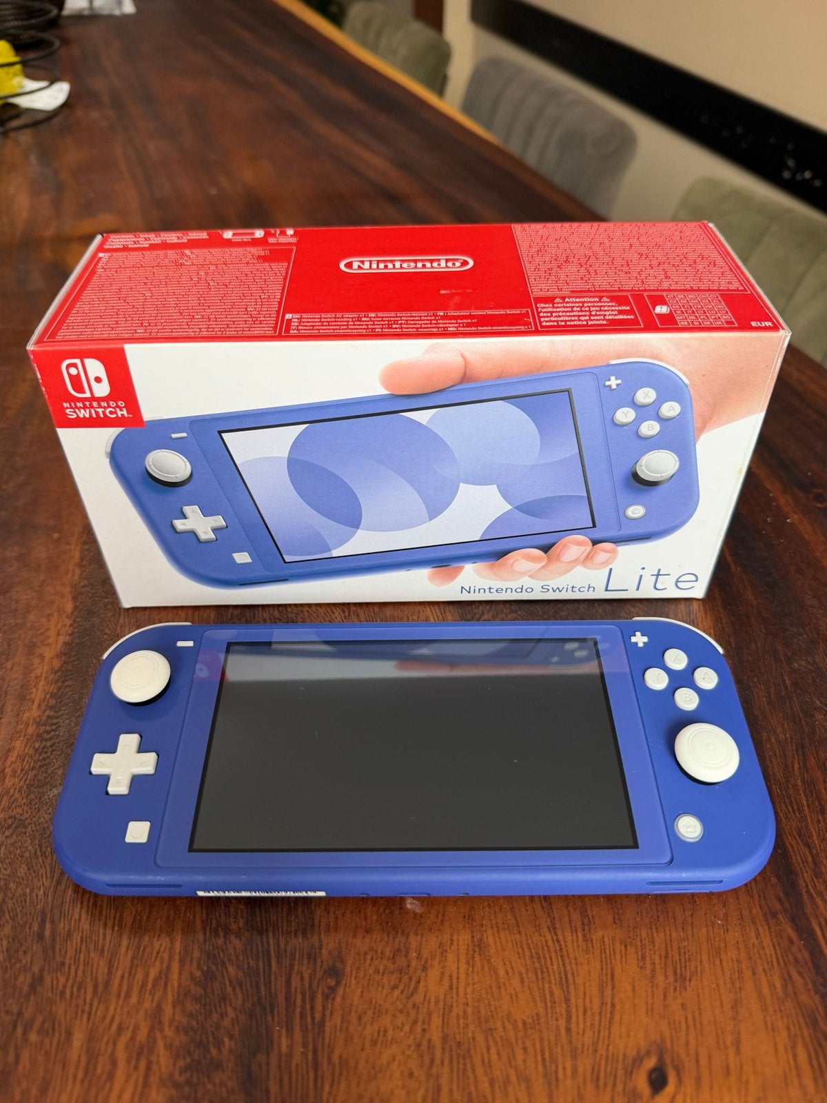 Nintendo Switch Lite Blauw met hoes en oplader