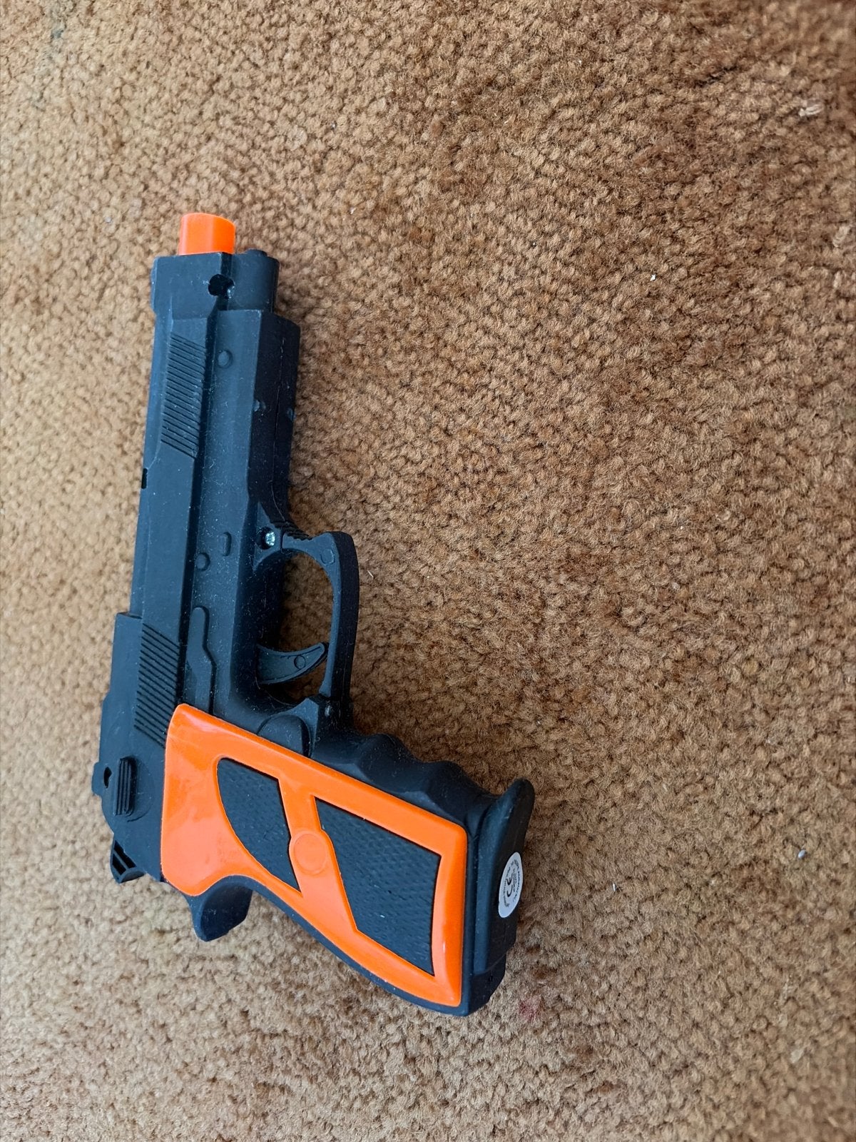 Speelgoedpistool met oranje accenten, Ophalen of Verzenden, Gebruikt, Jongen of Meisje