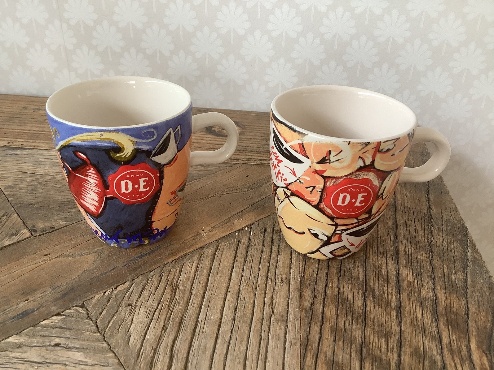 Douwe Egberts kopjes 2 stuks van Selwyn Sevatori design, Huis en Inrichting, Ophalen of Verzenden, Zo goed als nieuw, Overige stijlen