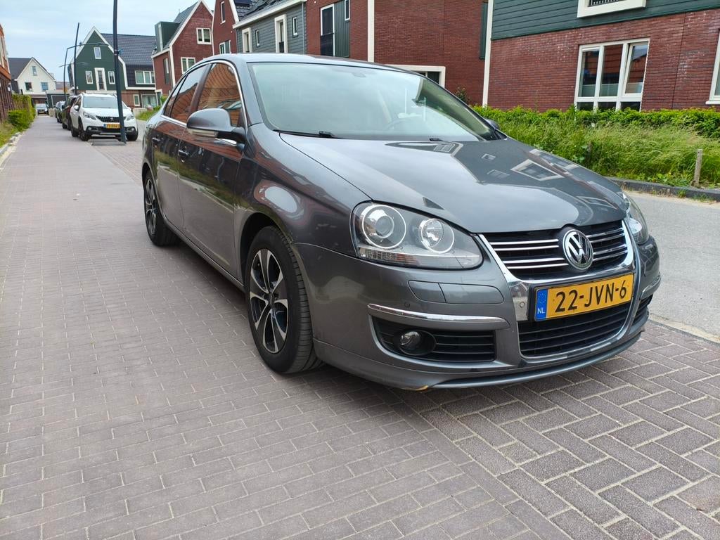 Volkswagen Jetta 1.4 TSI 118KW DSG 2009 Grijs, Beige, 160 pk, Particulier, Sedan