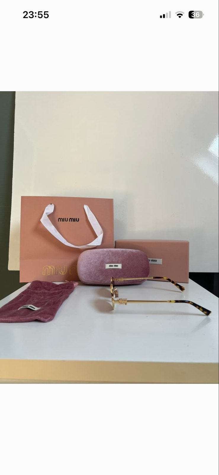 Miu Miu Zonnebril Goud met Donkere Glazen, Overige merken, Zonnebril, Overige kleuren, Ophalen of Verzenden