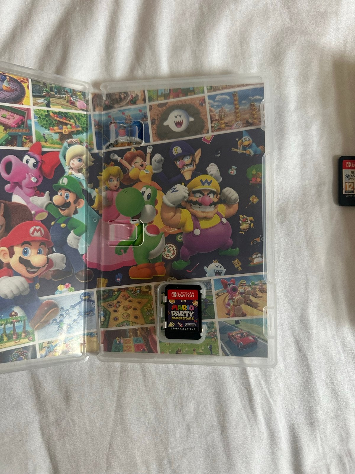 Foto 6 van Nintendo Switch OLED met 3 games en accessoires
