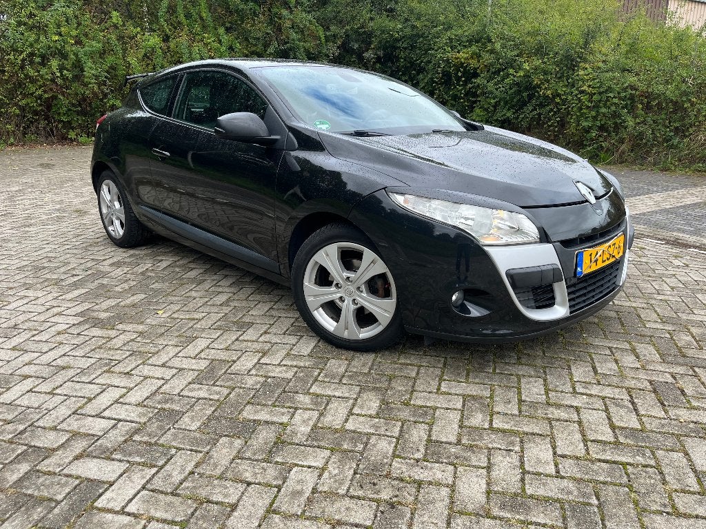 Renault Mégane TCe 130pk 2010 Zwart, Auto's, Voorwielaandrijving, Euro 5, 4 cilinders, 635 kg