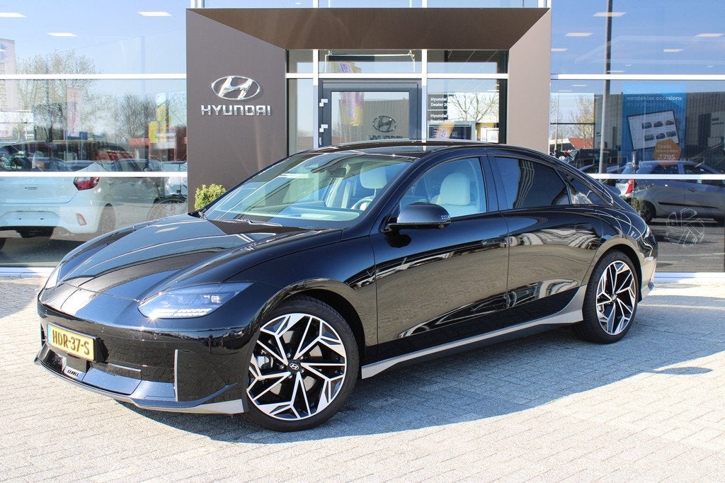 Hyundai IONIQ 6 Lounge AWD 77 kWh | 1500KG trekgewicht | V2L, Auto's, Hyundai, 12 maanden, Gebruikt, Zwart, Sedan