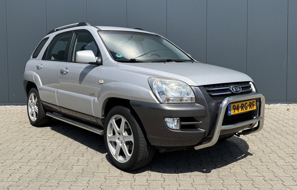 Kia Sportage 2.7 V6 Adventure 4WD Airco Cruise Trekhaak Nieu, Auto's, Kia, Automaat, Stof, Gebruikt, Zwart