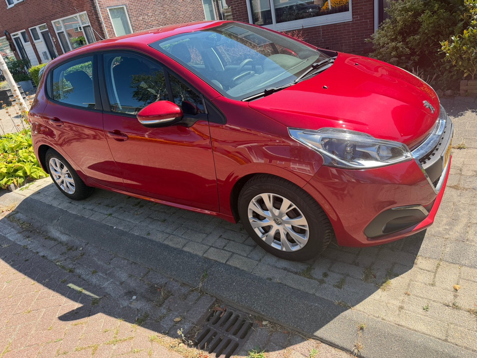 Peugeot 208 1.2 (2016), Auto's, Stof, Zwart, Overige carrosserieën, Handgeschakeld