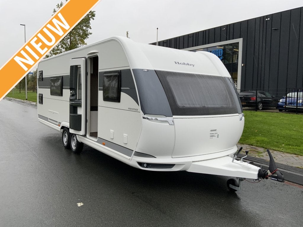 Hobby Prestige 650 Kfu, Caravans en Kamperen, Schokbreker, Rondzit, 7 tot 8 meter, Bedrijf