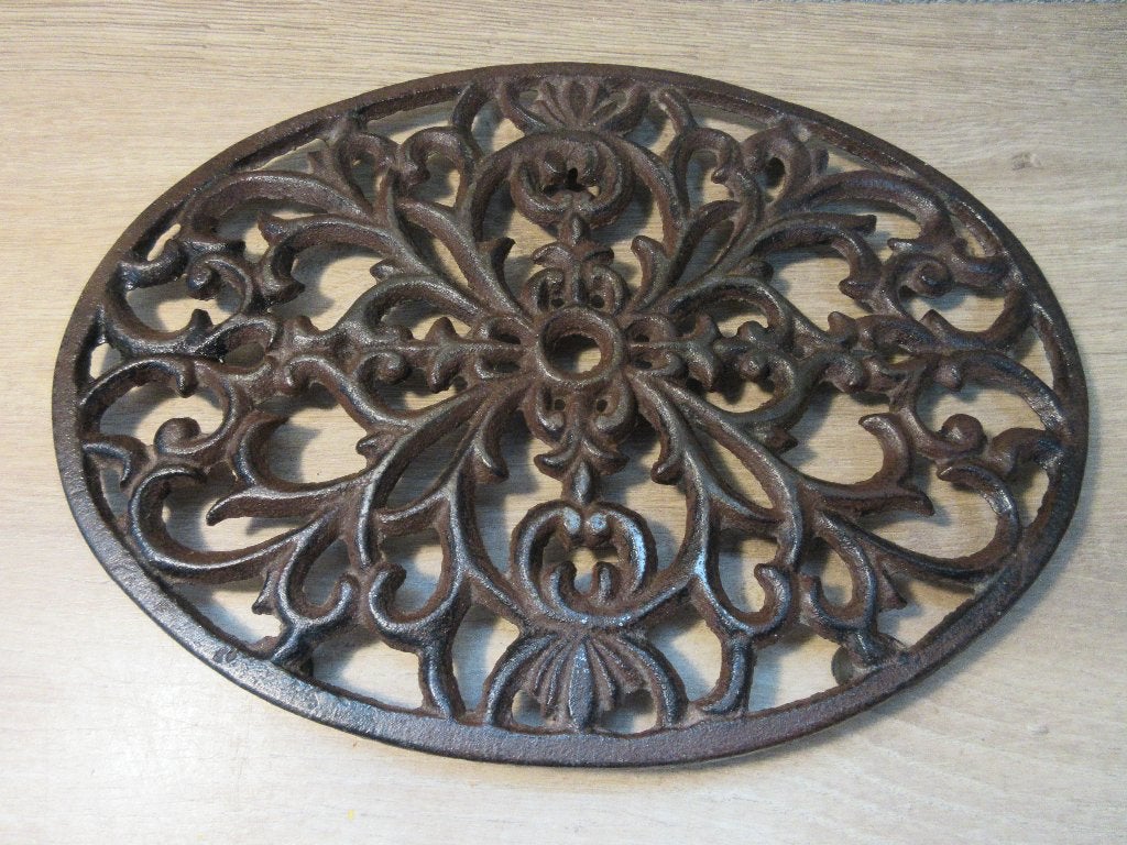Brocante gietijzeren onderzetter, Ophalen of Verzenden