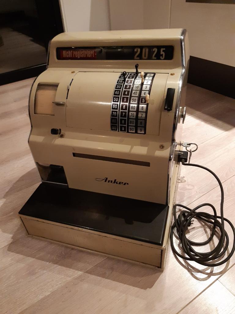 Werkende vintage Anker kassa, Ophalen