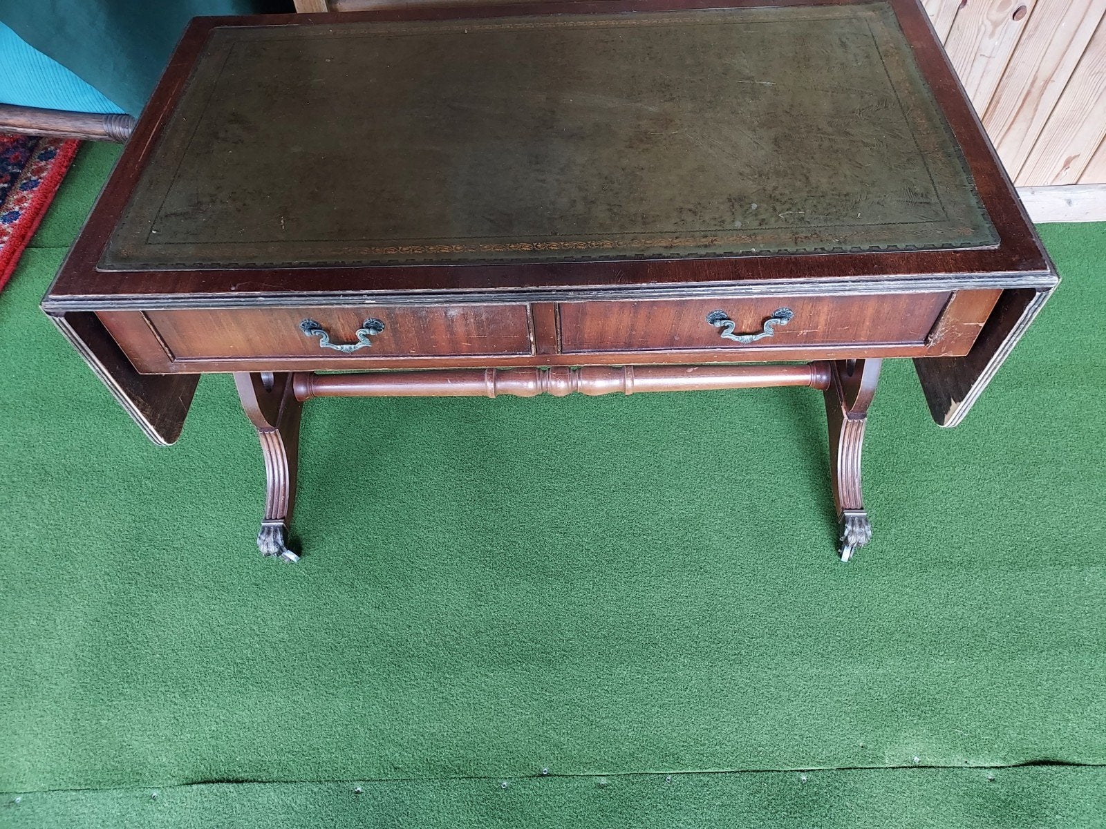 Antieke uitklapbare lage tafel, Ophalen