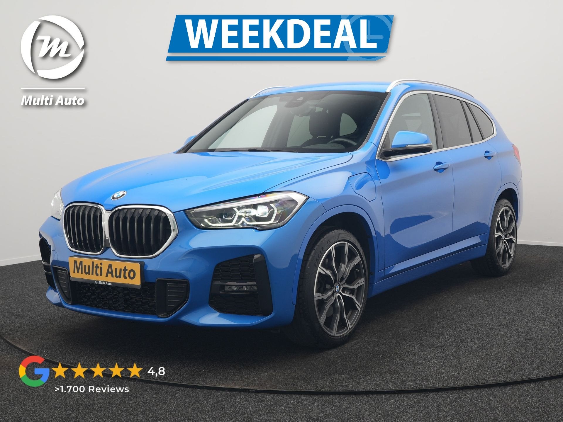 BMW X1 xDrive25e M Sport PHEV 221pk Dealer O.H. | Camera | S, Auto's, Gebruikt, Blauw, Leder en Stof, Bedrijf