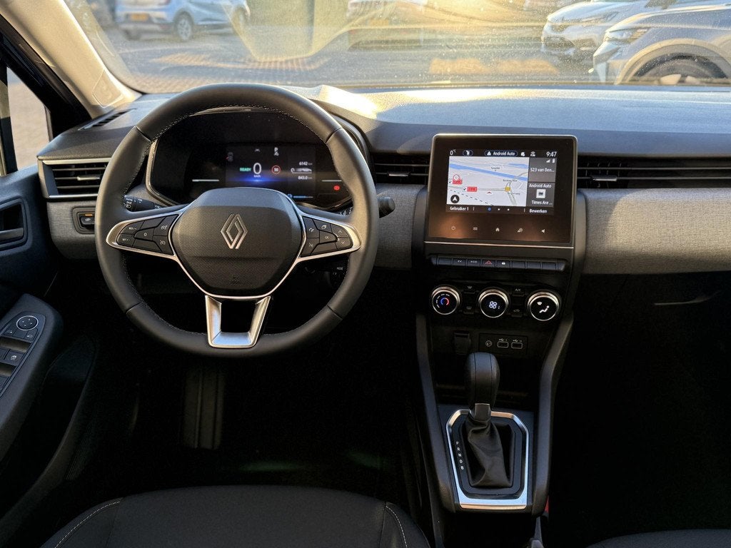 Renault Clio 1.6 E-Tech Full Hybrid 145 evolution | Demo | N, Auto's, Renault, Stof, Met garantie (alle), Zwart, Bedrijf