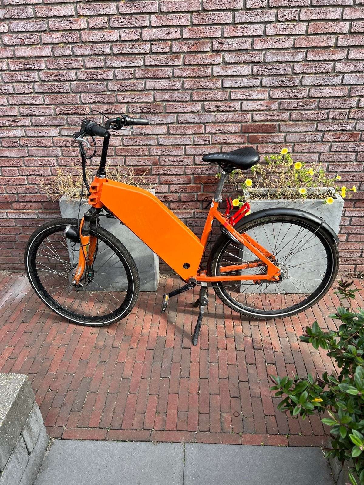 Oranje elektrische fiets - Zo goed als nieuw, Overige merken, Gebruikt, Ophalen of Verzenden, 55 tot 59 cm