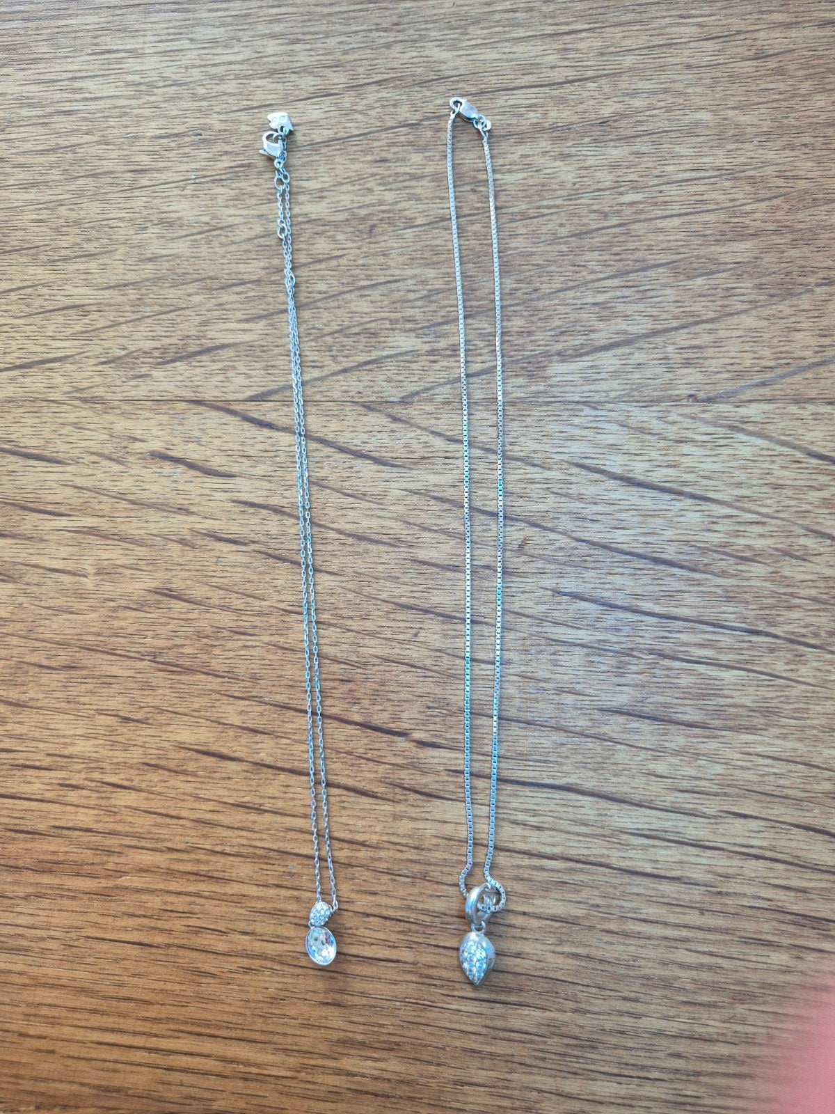 2 zilveren kettingen met hanger, waarvan 1 Swarovski, Gebruikt, Ophalen of Verzenden, Met kristal, Zilver