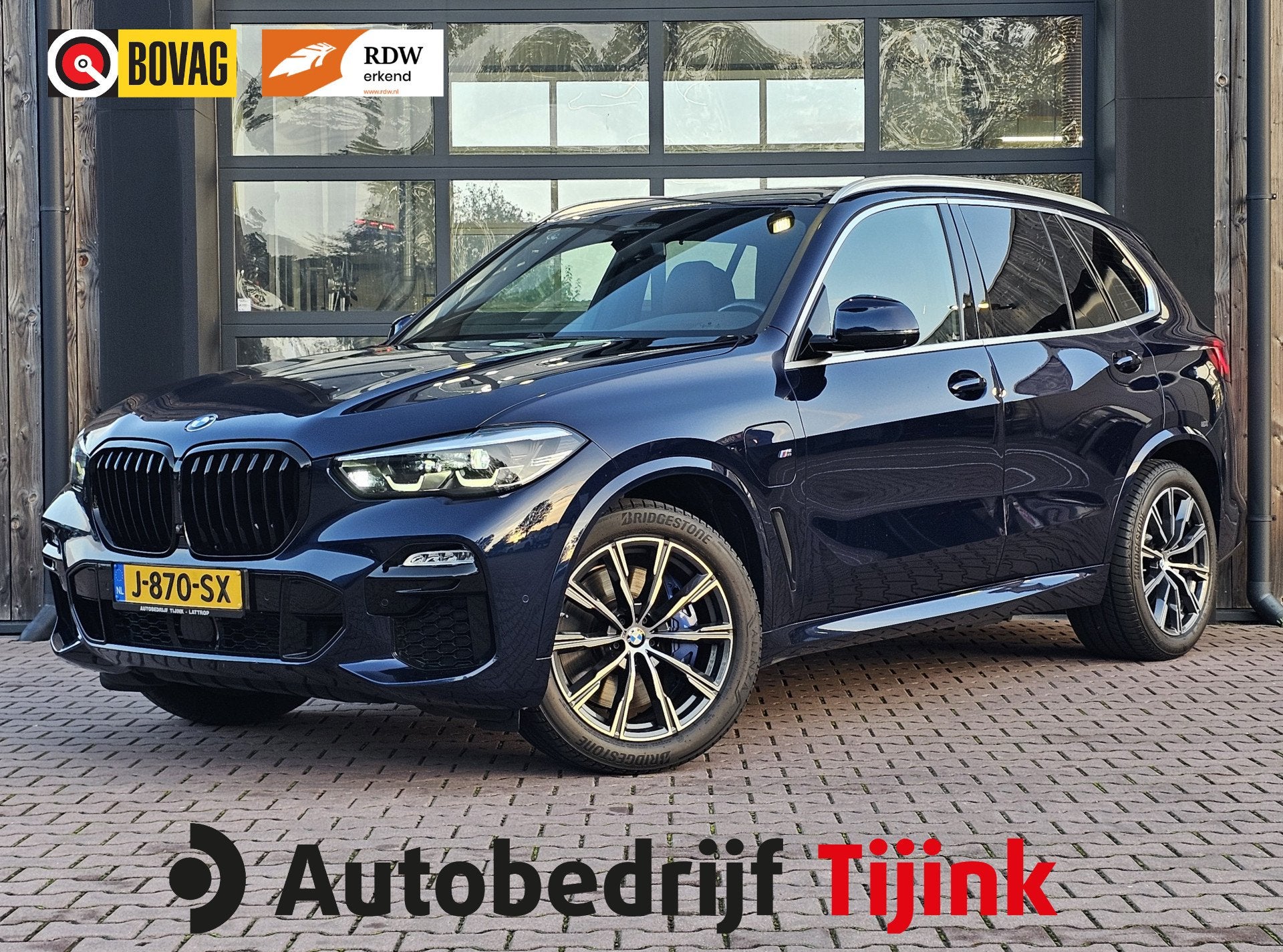 BMW X5 xDrive45e High Executive M-Sport | Luchtvering | Elek, Gebruikt, 398 pk, Met garantie (alle), Blauw