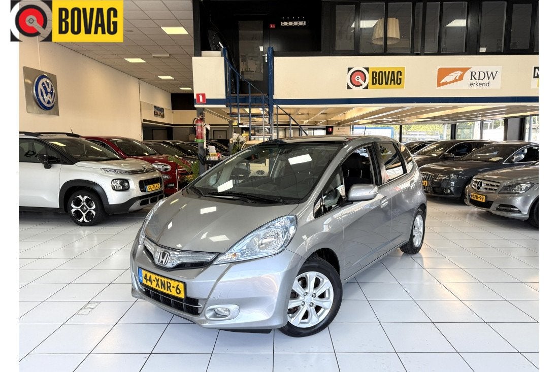 Honda Jazz 1.4 Hybrid Elegance Bovag Garantie 1e Eigenaar, Euro 5, Stof, Gebruikt, 4 cilinders
