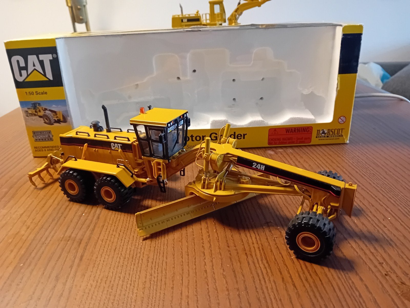 cat 24H motorgrader, Ophalen of Verzenden