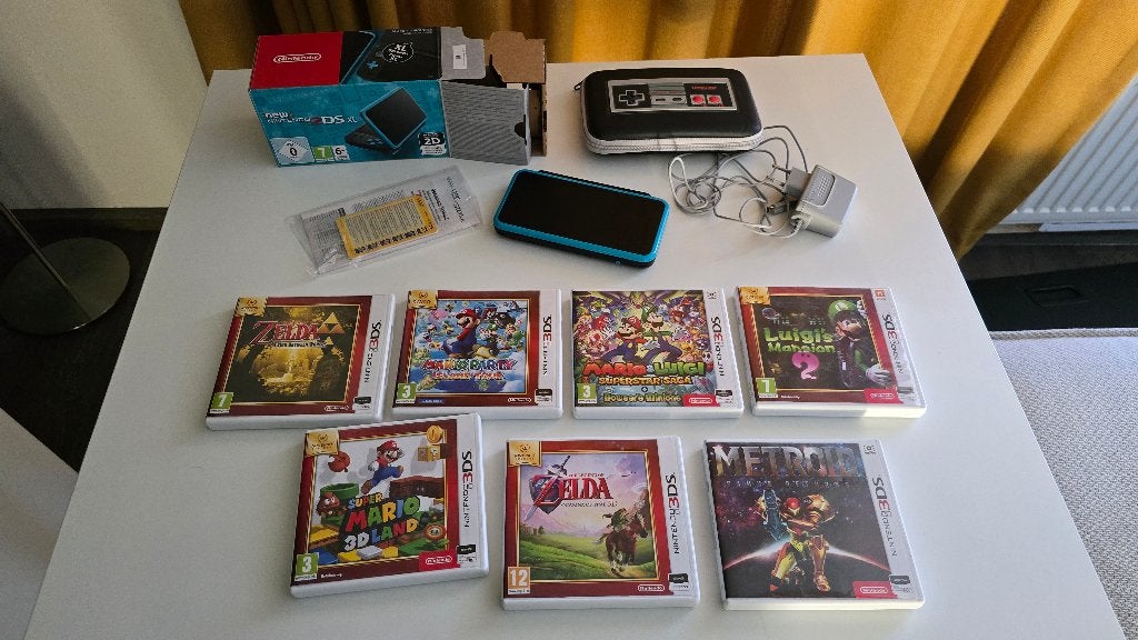 New Nintendo 2DS XL – Zo goed als nieuw + 7 games + doos, Spelcomputers en Games, Blauw, 2DS XL, Zo goed als nieuw, Ophalen