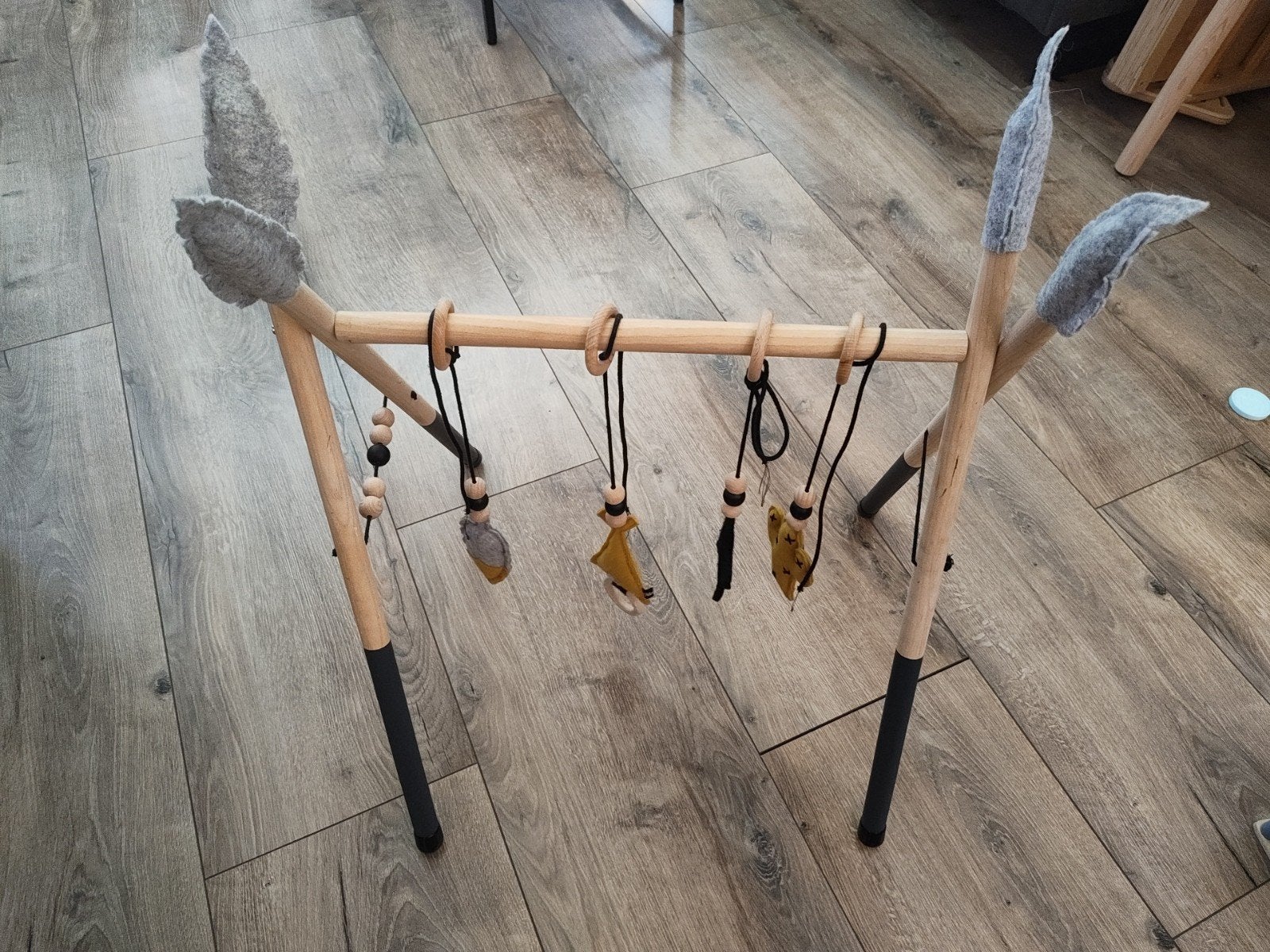 Houten babygym met vilten speeltjes, Ophalen