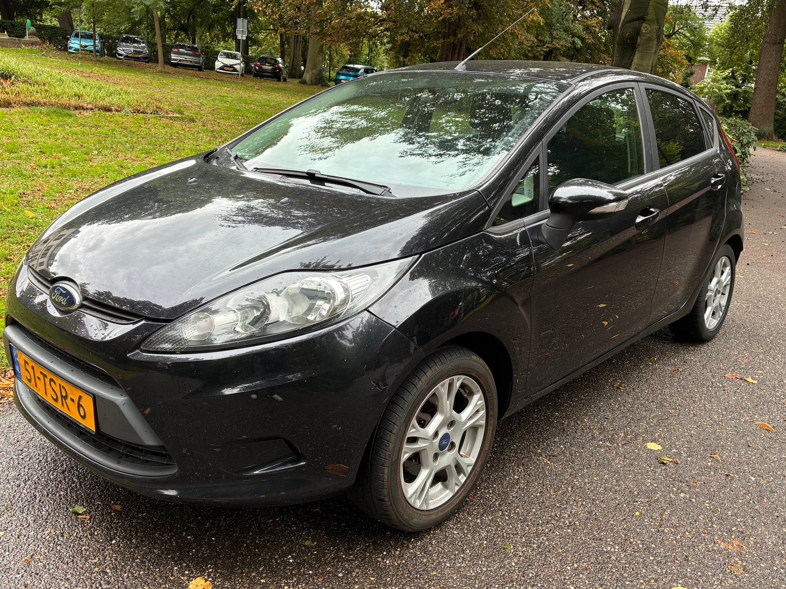 Ford Fiësta 1.25 60KW 5DR 2012 Zwart, Auto's, Ford, Voorwielaandrijving, Stof, Zwart, Handgeschakeld