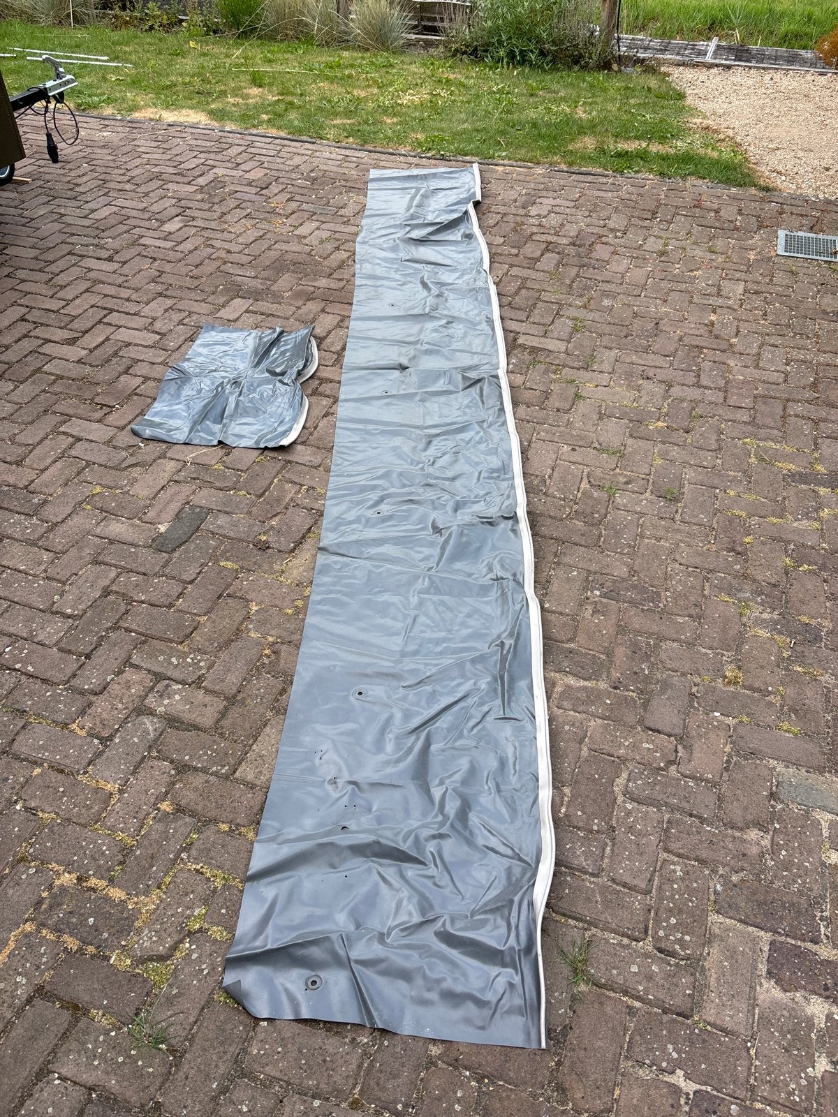 Grijze caravan tochtstrook/modderflap, Caravans en Kamperen, Kampeeraccessoires, Ophalen, Gebruikt