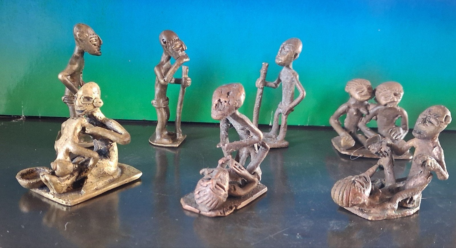 Afrikaanse bronzen beeldjes. Miniatuur.  7 stuks., Antiek en Kunst, Afrika, Goud, Handgemaakt, Ophalen of Verzenden