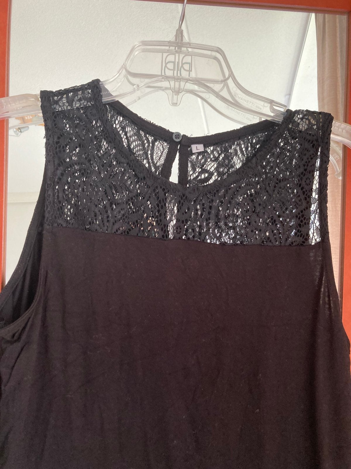 2 zwarte mouwloos shirt opengewerkt bovenstuk 1doorschijnend, Ophalen of Verzenden, Zo goed als nieuw, Zwart, Korte mouw