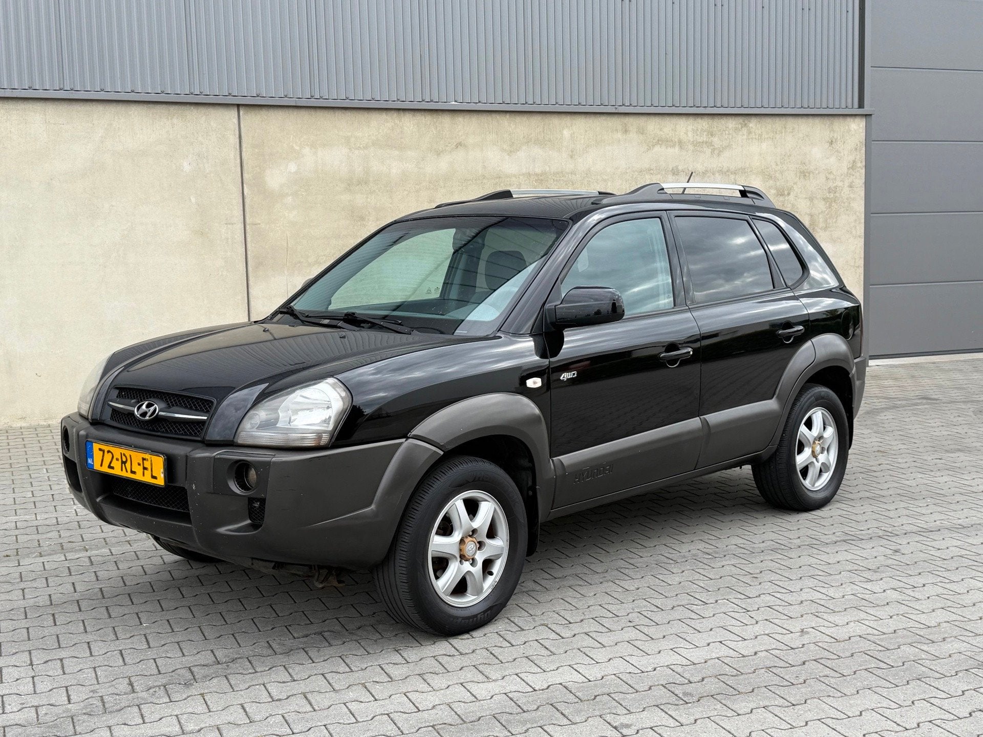 Hyundai Tucson 2.7i V6 4WD Style NAP+AUTOMAAT+Climate+Cruise, Auto's, Automaat, Gebruikt, 2656 cc, Zwart