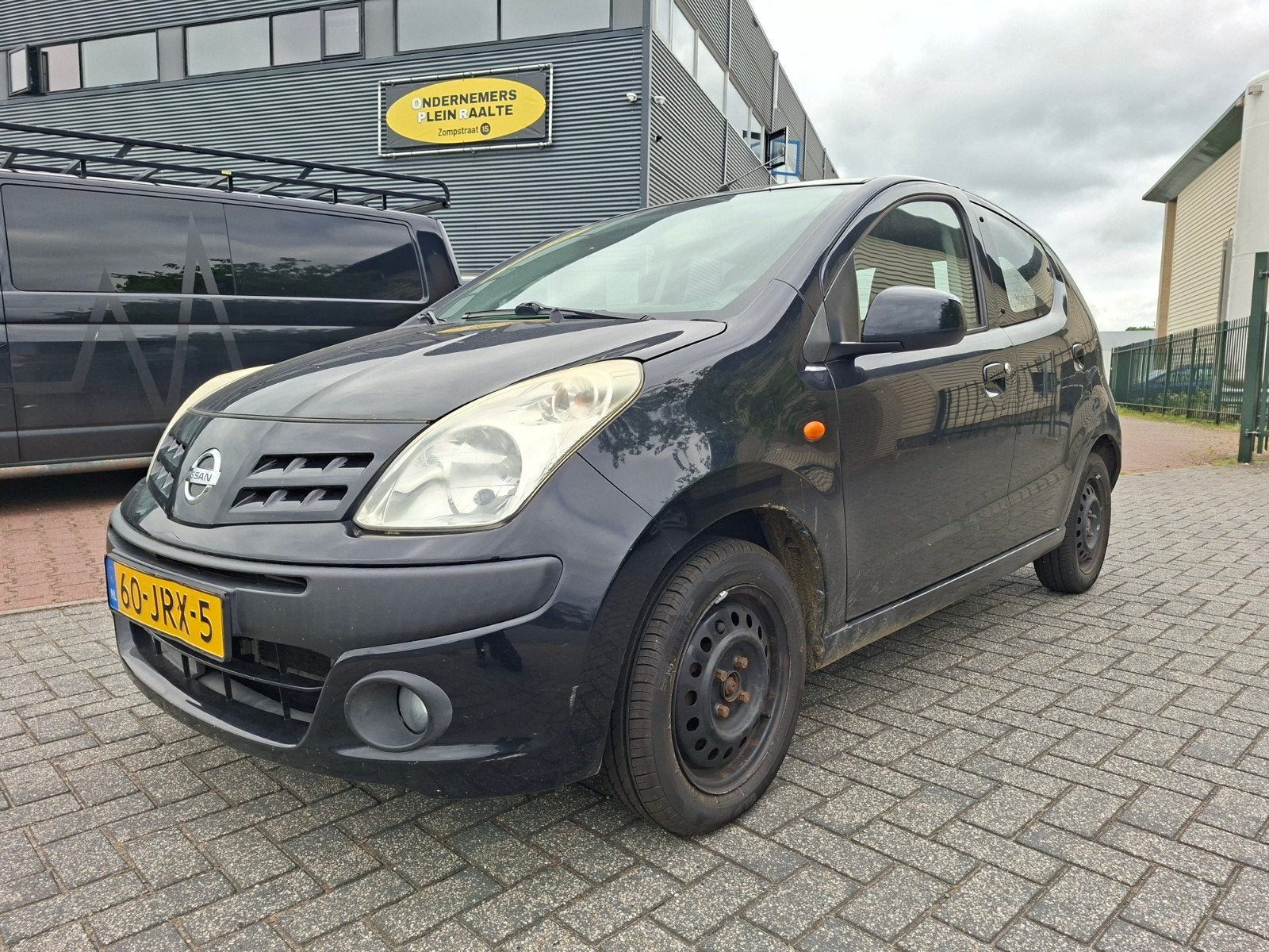 Nissan Pixo 1.0 50KW 5D 2009 Zwart, Auto's, Nissan, Voorwielaandrijving, 200 kg, 4 stoelen, Origineel Nederlands