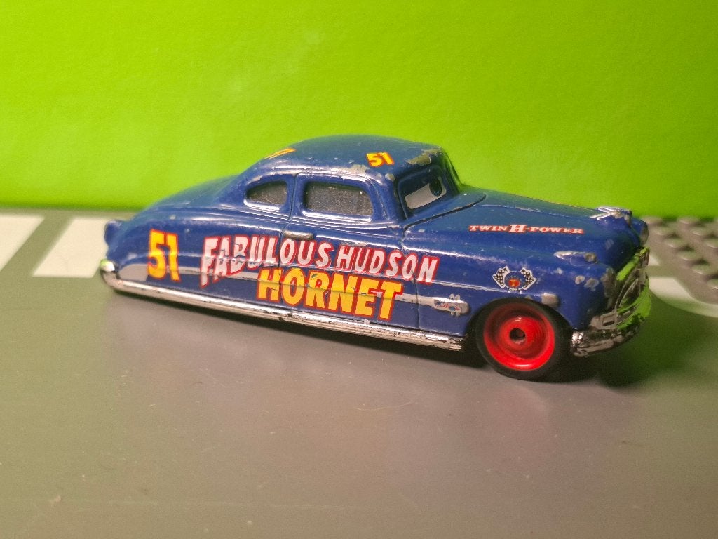Disney Cars - Fabulous Hudson Hornet [blauw] 1/55 1, Ophalen of Verzenden, Gebruikt