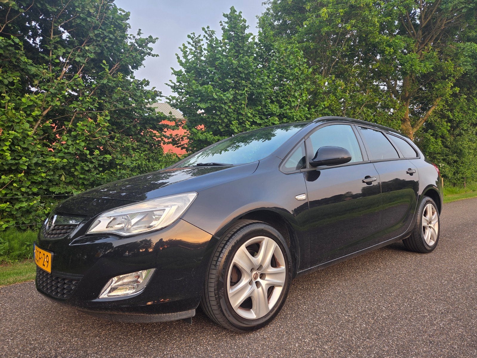 Opel Astra 1.4 ST 2011 Zwart APK 02-2027 goed onderhouden, Voorwielaandrijving, 4 cilinders, 100 pk, Zwart