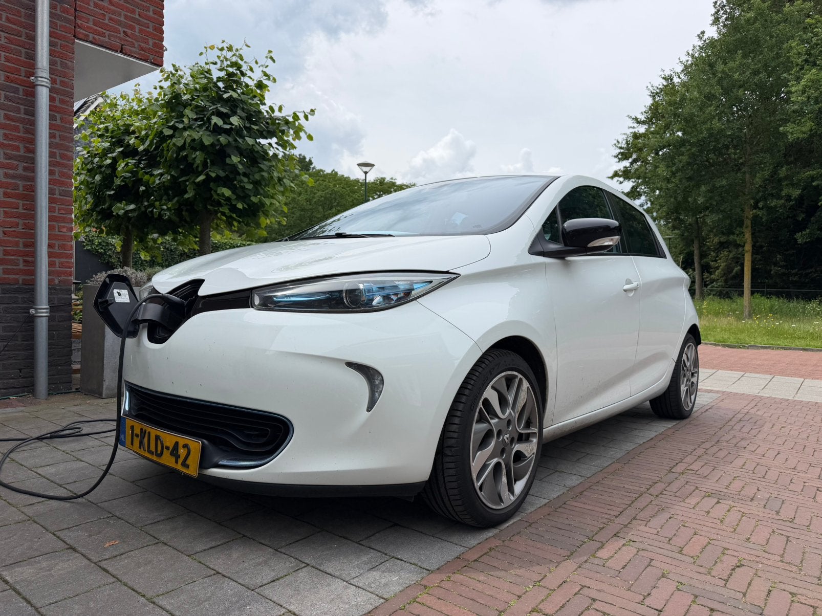 Renault ZOE E 2013 Wit | Intens 43KwH. Netjes met storing., Navigatiesysteem, Stof, Euro 6, Origineel Nederlands