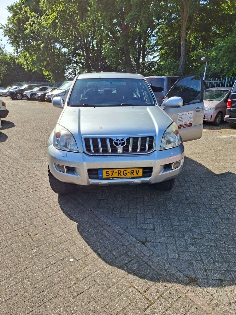 Toyota Landcruiser 3.0 D-4d 3DR VX AUT 2004 Grijs, Auto's, Stof, Zwart, 4 cilinders, 163 pk