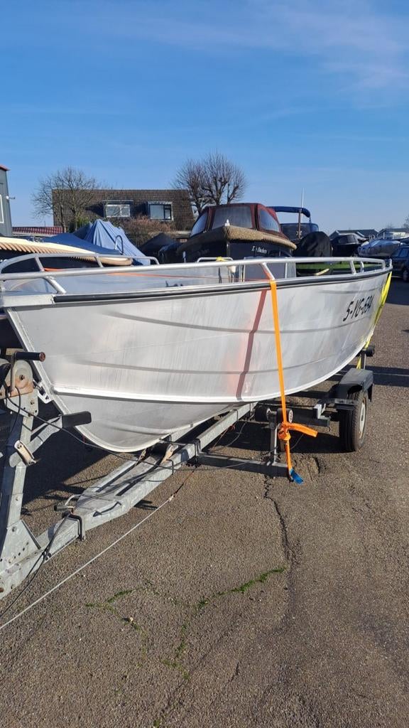 Nette Qwest 50R met Df 50 Suzuki en trailer., Overige typen, Ophalen of Verzenden, Zo goed als nieuw, Met peddels