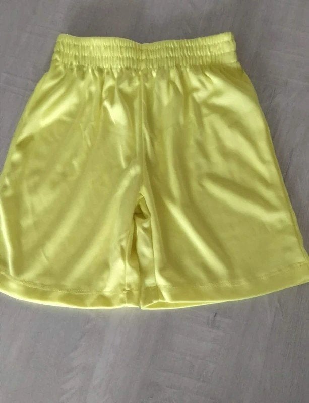 Fluo gele short maat 98 - 104 / nieuw, Broek, Zeeman, Nieuw, Ophalen of Verzenden