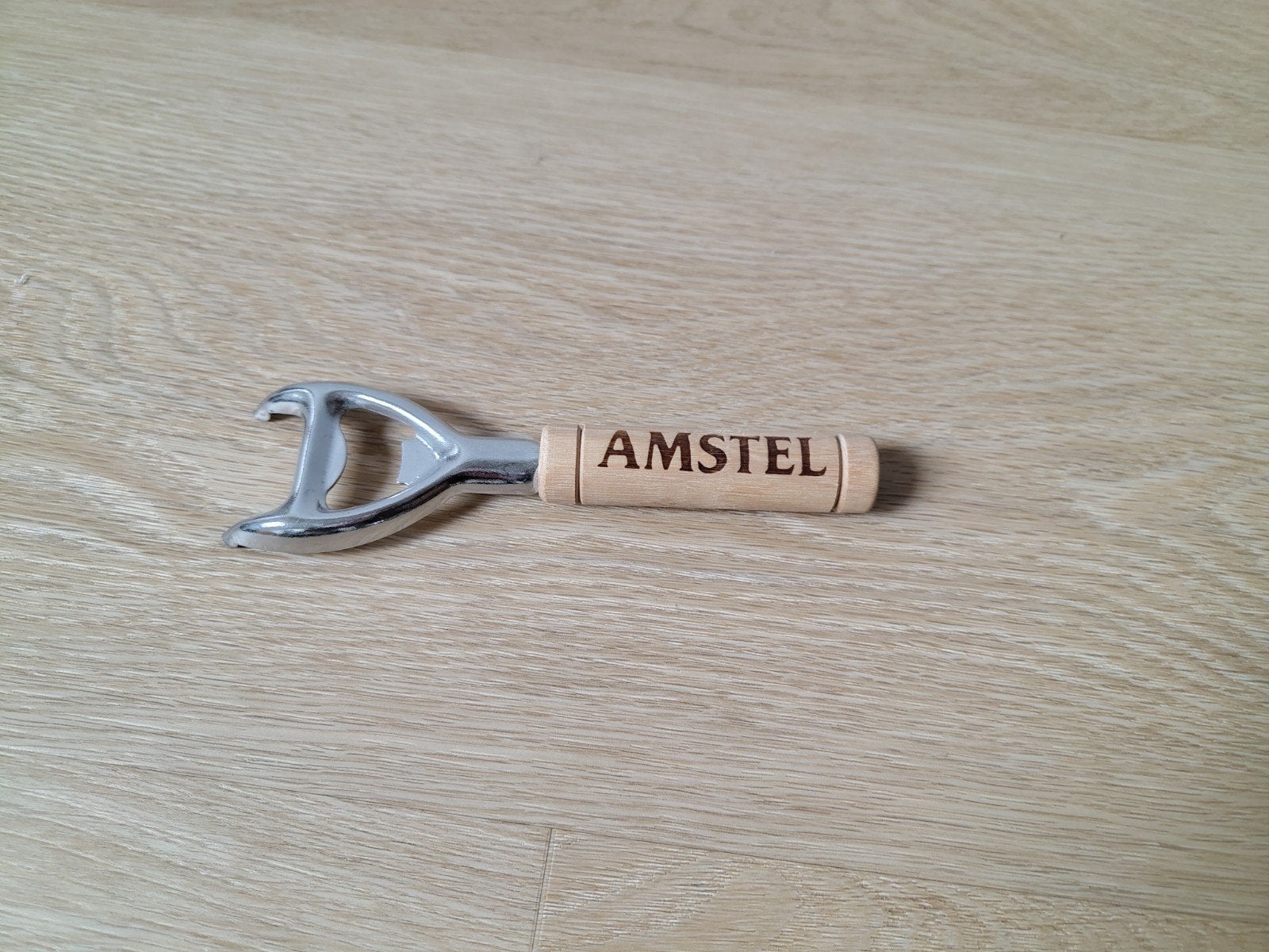 Amstel flesopener met houten handvat, Ophalen, Nieuw