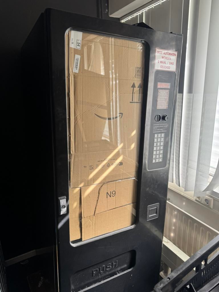 Vending machine/snoepautomaat, Ophalen