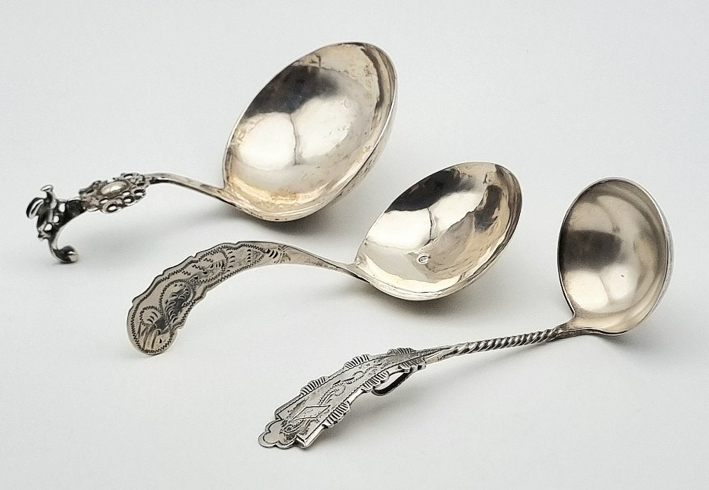 1143. Zilveren roomlepels, 19e/20e eeuw, Ophalen, Zilver