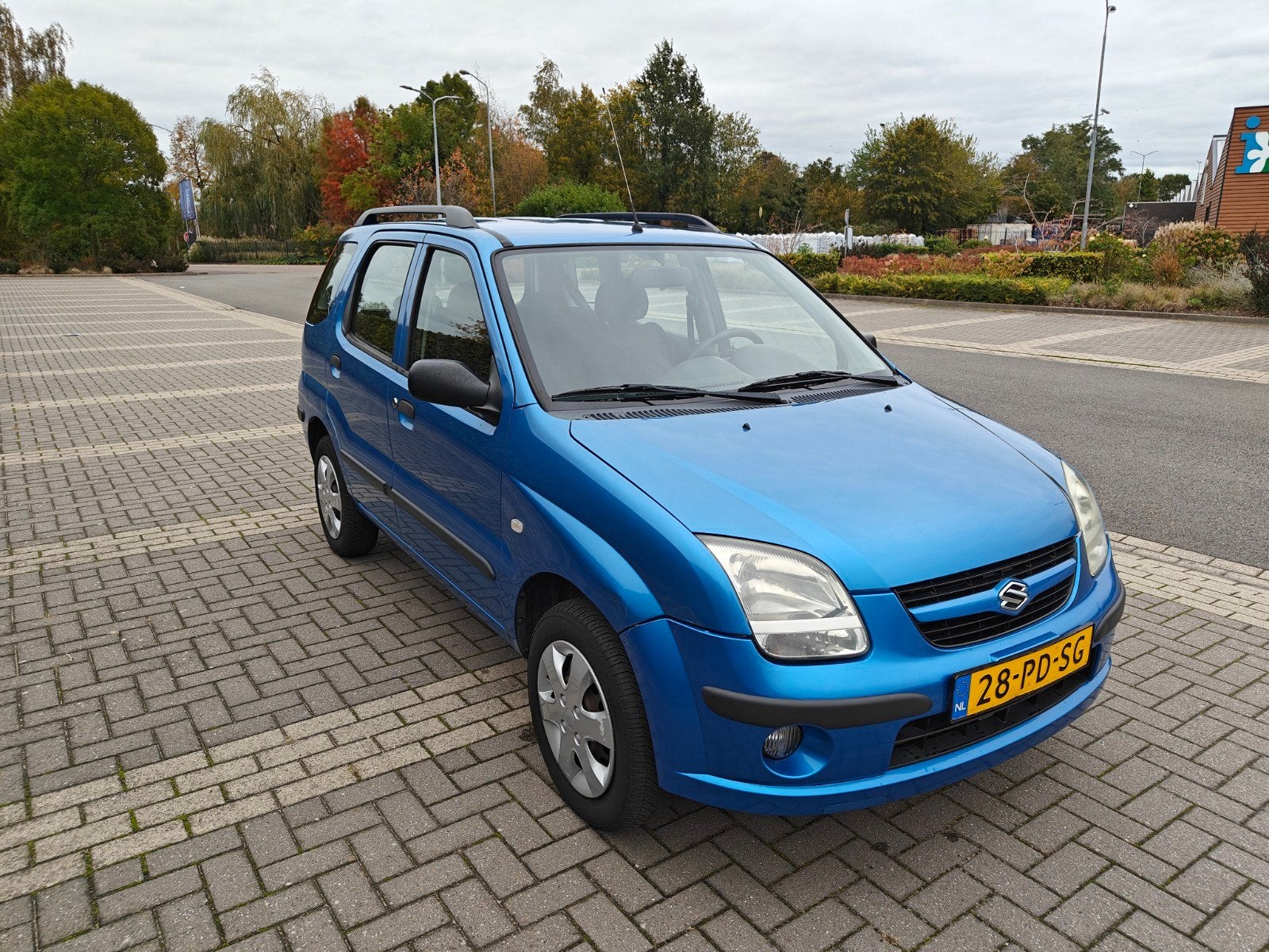 Suzuki Ignis 1.5 5D 2004 Handgeschakeld Blauw, Auto's, Voorwielaandrijving, Dealer onderhouden, 4 cilinders, Stationwagon