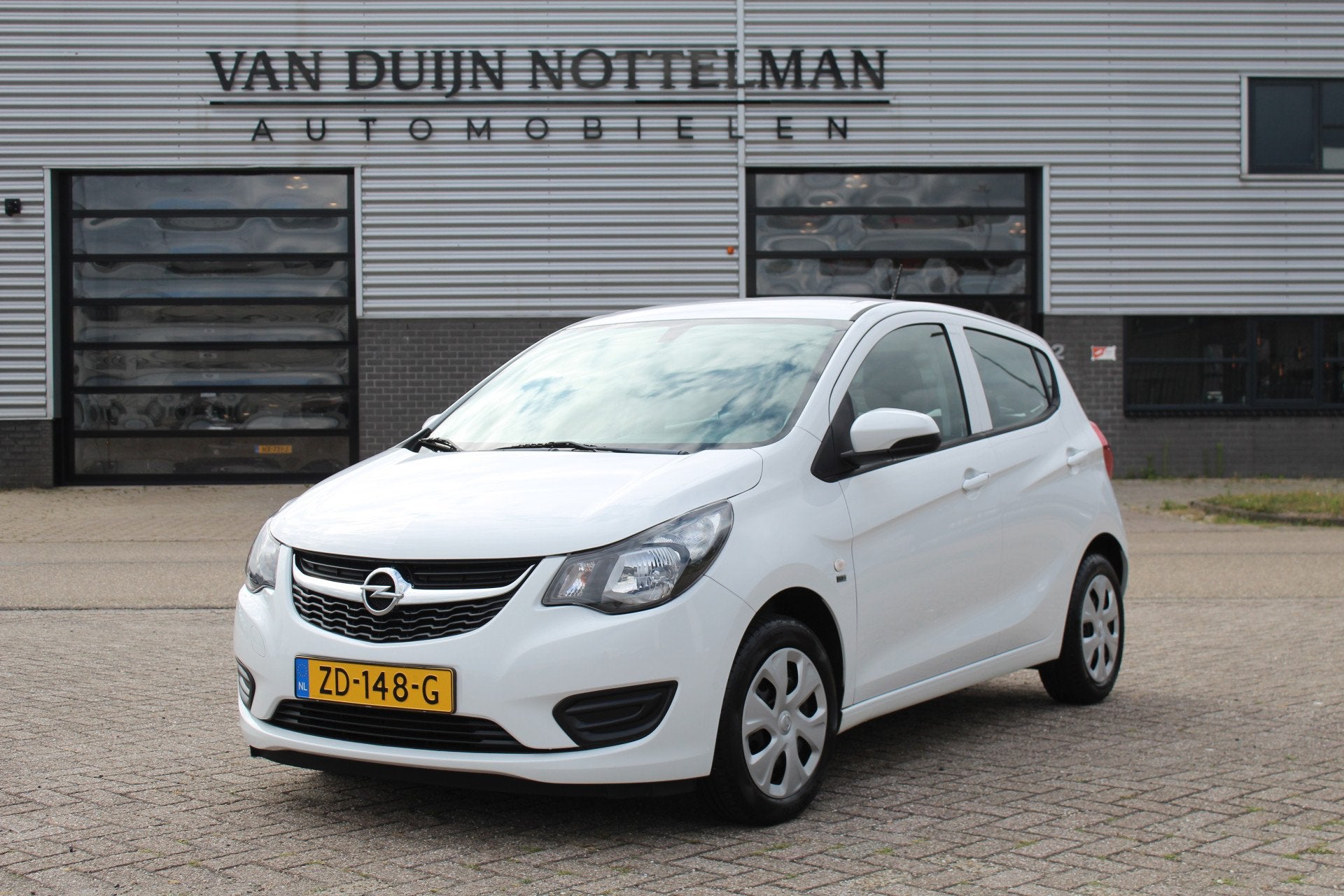 Opel KARL 1.0 ecoFLEX 120 Jaar Edition / Airco / Cruise / N., Auto's, Stof, Met garantie (alle), Wit, Origineel Nederlands