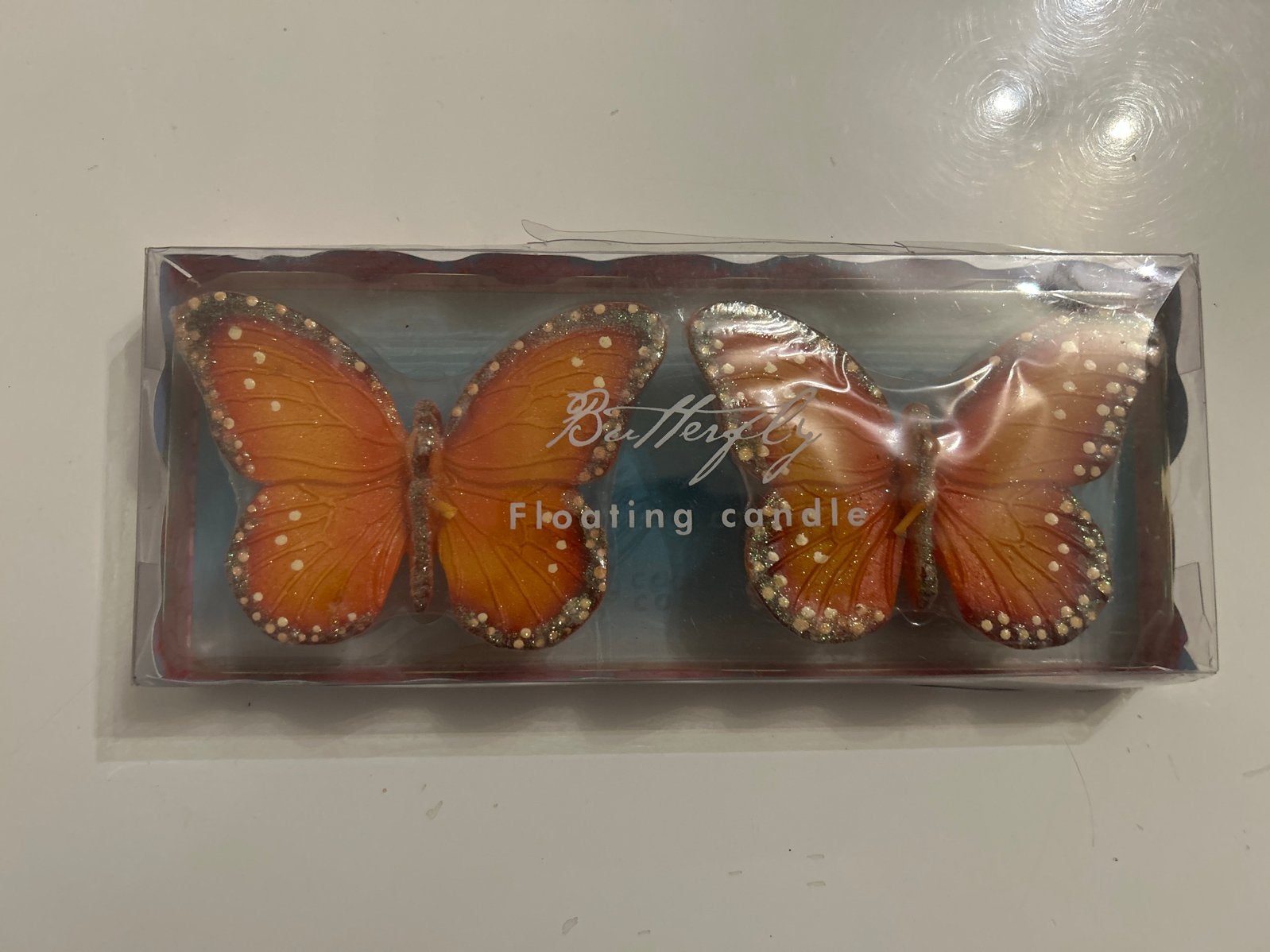 Set van 2 drijvende vlinderkaarsen - Oranje. Nieuw., Oranje, Ophalen of Verzenden, Kaars, Was
