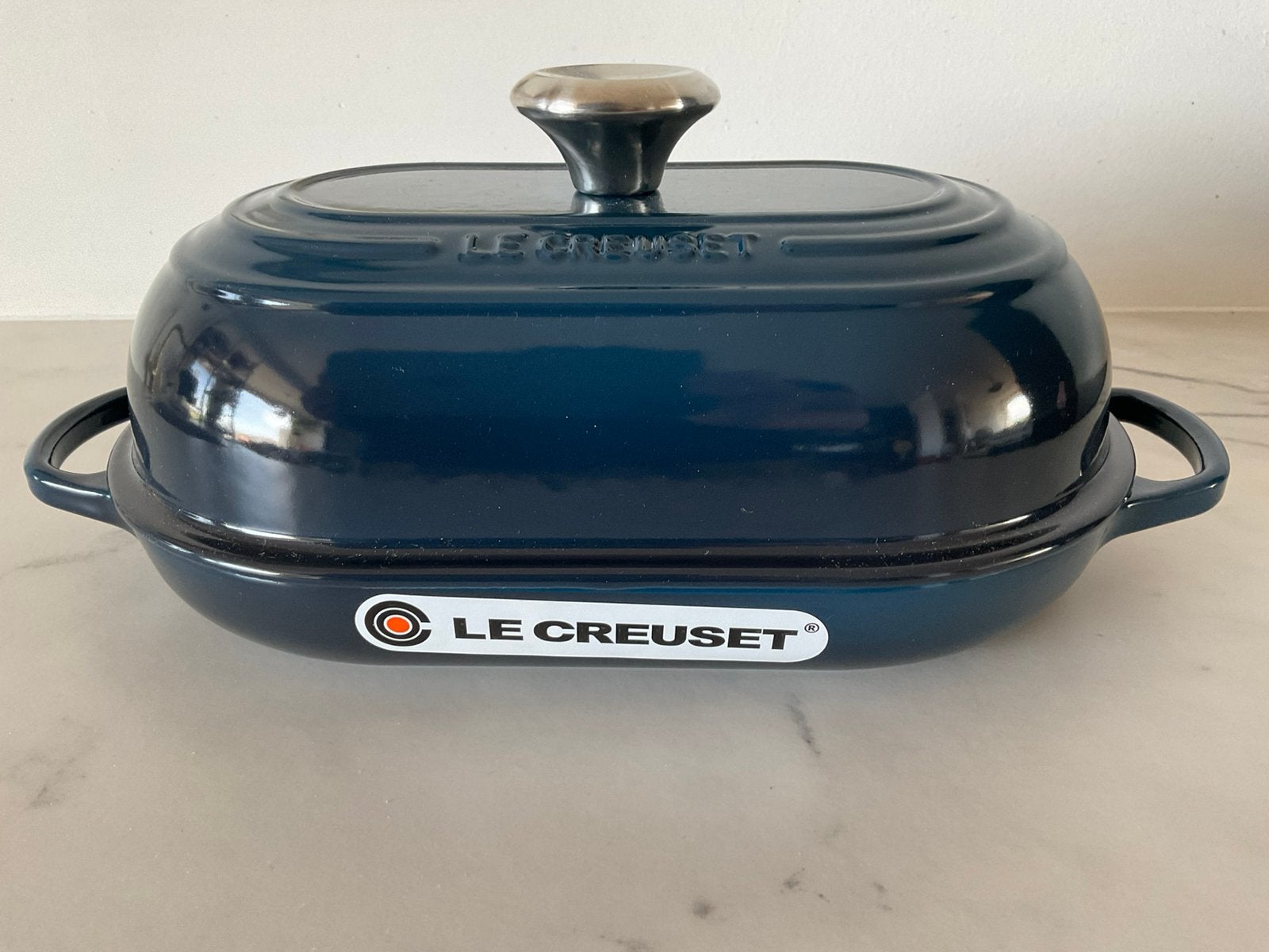 Le Creuset 29 cm ovale broodpan, nuit blauw, nieuw, Huis en Inrichting, Keuken | Potten en Pannen, Nieuw, Le Creuset, Ophalen of Verzenden