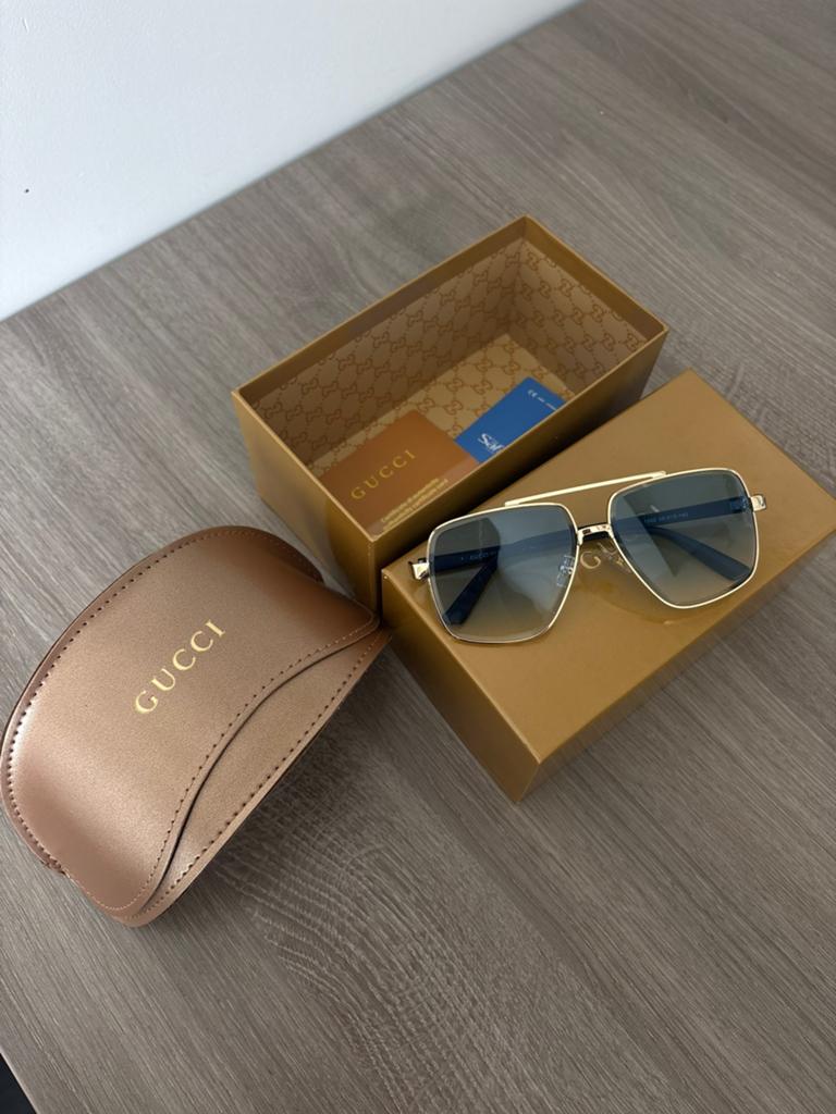Gucci zonnebril, Ophalen of Verzenden, Zo goed als nieuw, Zwart, Overige merken