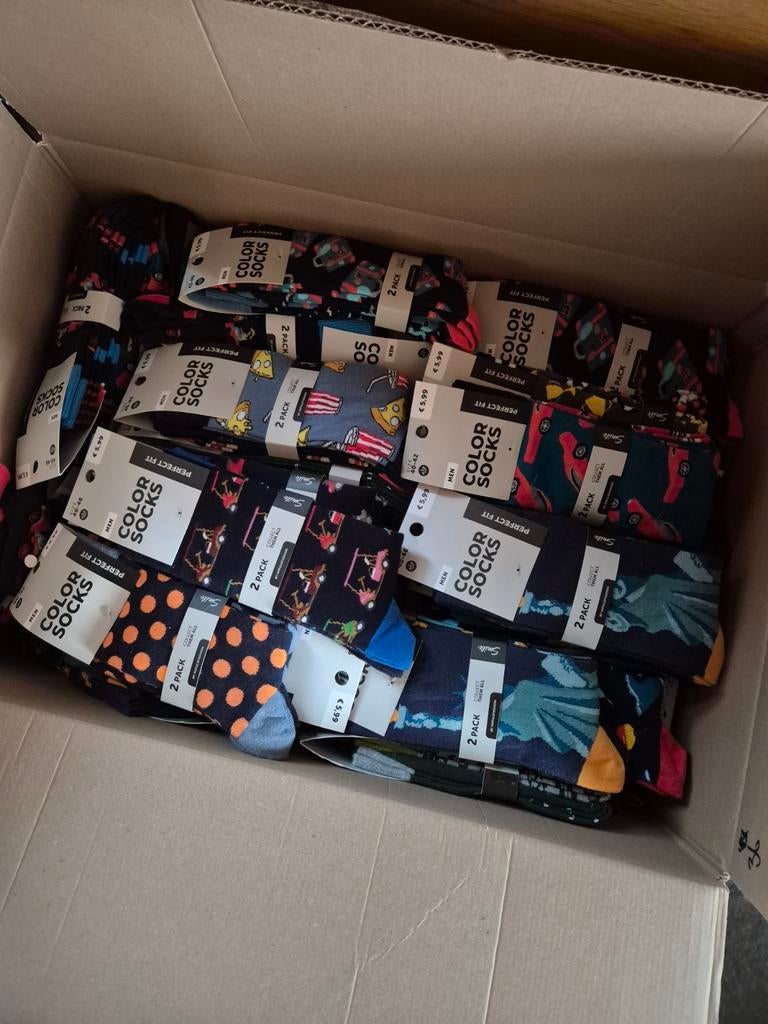 Te koop partij nieuwe sokken met opdruk., Ophalen