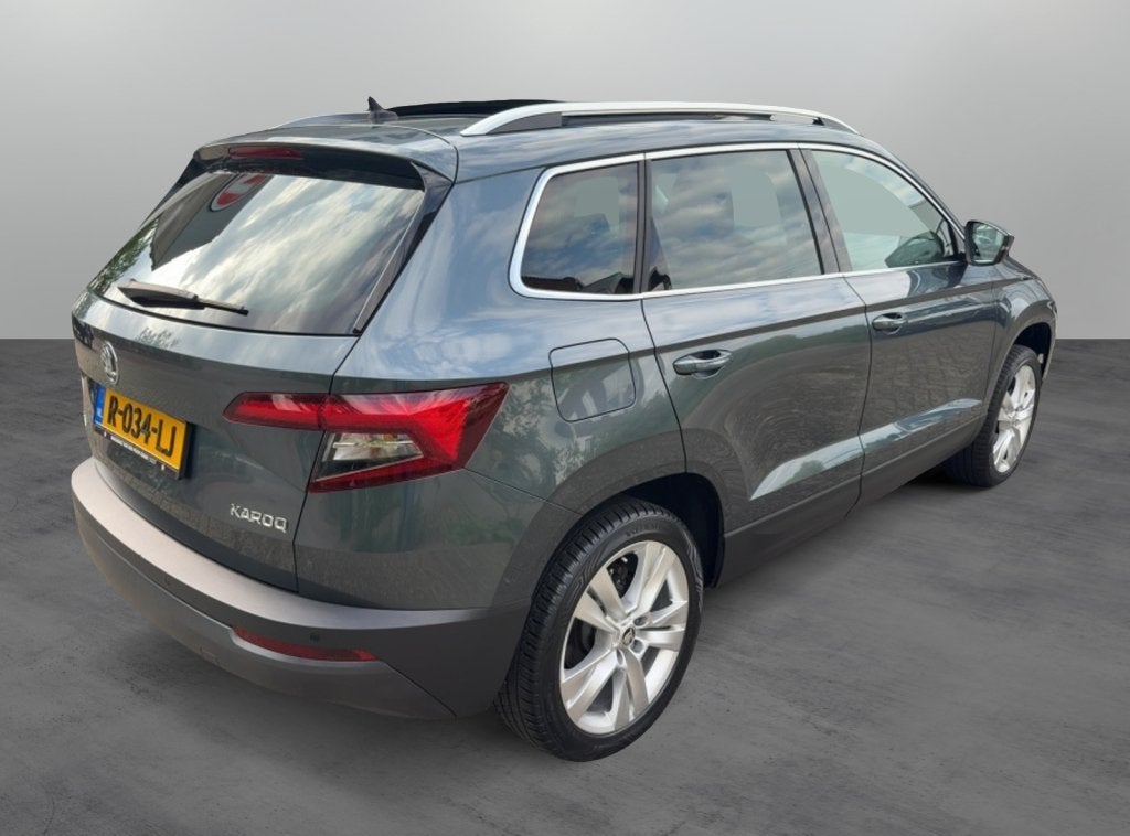 Skoda Karoq 1.0 TSI Style Business Panoramadak (bj 2019), Auto's, Skoda, Automaat, 12 maanden, Gebruikt, 1261 kg